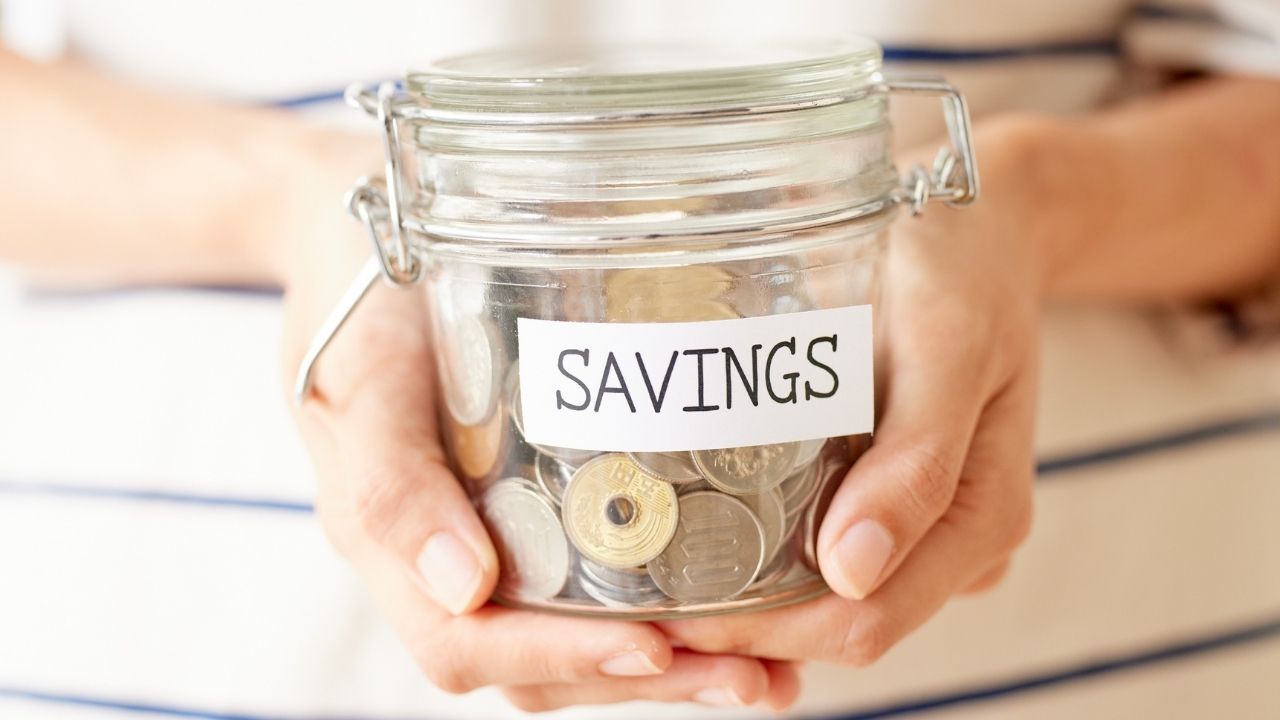 jar%20labeled%20%E2%80%9CInvestments%E2%80%9D%20filled%20with%20coins.